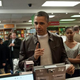 President Barack Obama speaks to a cashier as he pays for books with daughters Malia and Sasha at the Politics & Prose bookstore in Washington, D.C., on Nov. 30, 2013, as part of Small Business Saturday.
NICHOLAS KAMM/AFP/Getty Images
